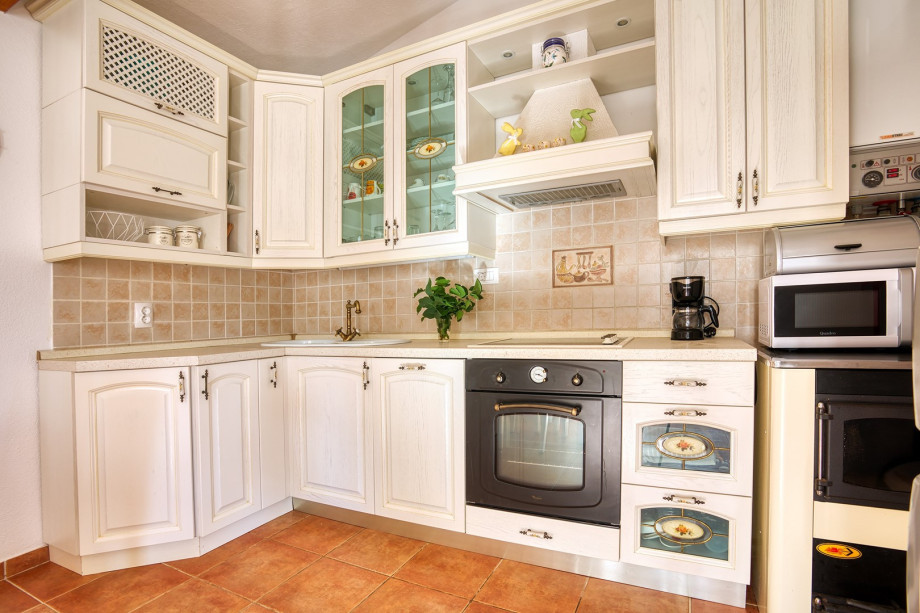 Fully equipped kitchen next to the dining area