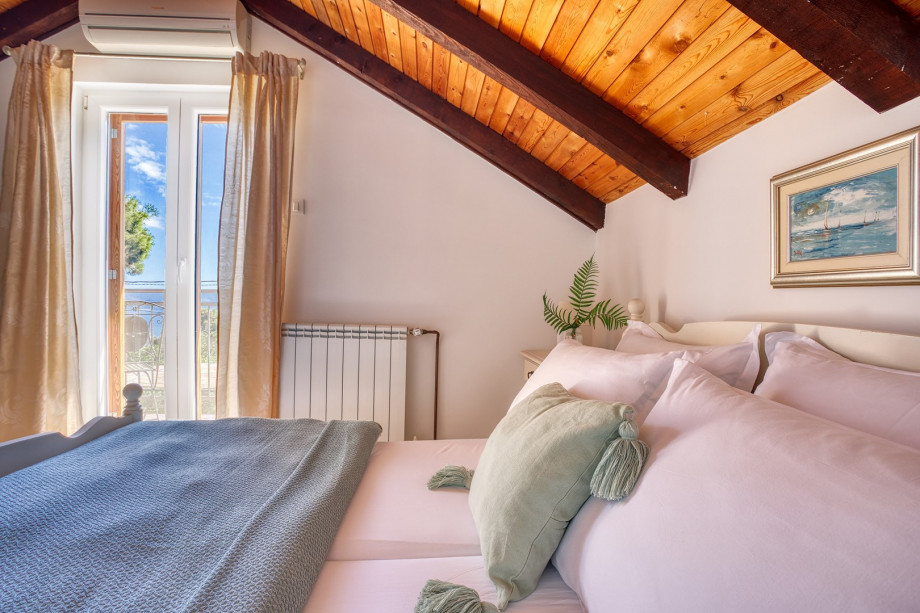 Bedroom No2 (first floor) offers a balcony with lounge corner