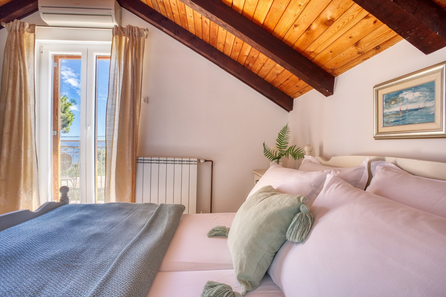 Bedroom No2 (first floor) offers a balcony with lounge corner