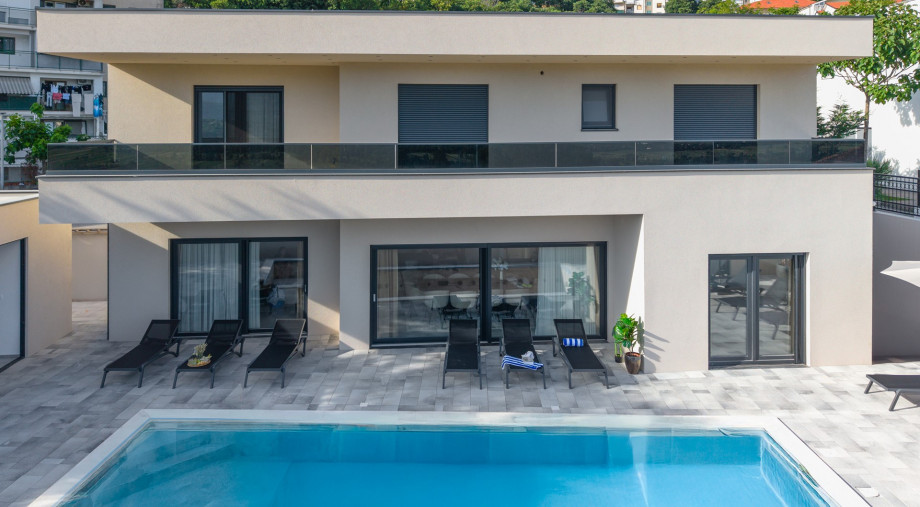 The outdoor area features a private swimming pool measuring 10m x 4m, inviting you for refreshing dips under the sun