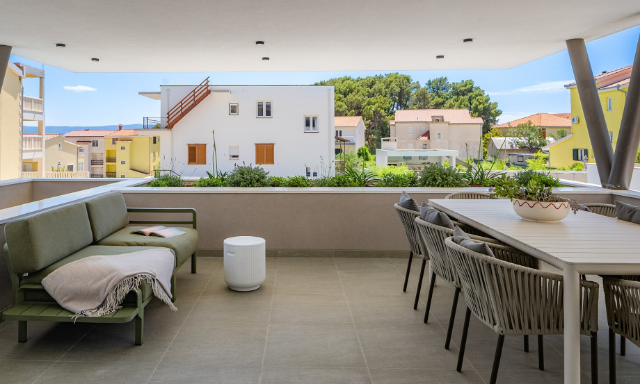 The tranquil surroundings effortlessly blend indoor and outdoor living, allowing for seamless gatherings and unforgettable moments with loved ones.