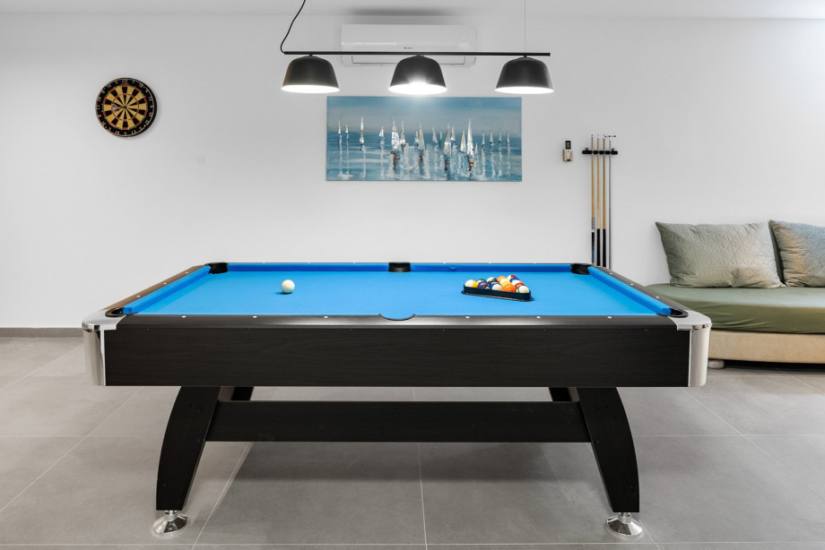 For even more relaxation, head to the villa’s wellness and fun area located on the lower level (indoor staircase)