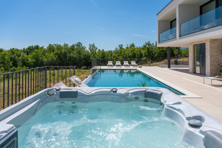 The outdoor whirlpool provides the perfect spot to soak away your cares.