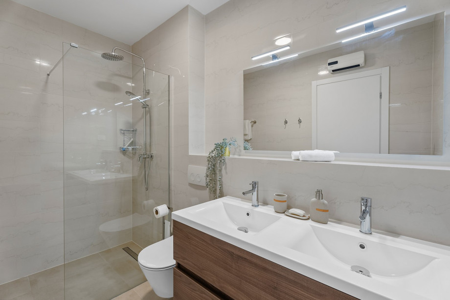 En suite bathroom with  a shower.