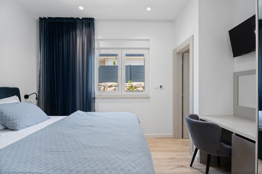 Bedroom No.2 also offers an en-suite bathroom with a refreshing shower, a TV, A/C,