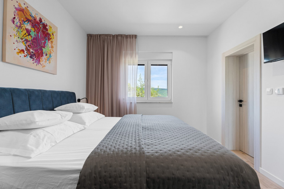 Bedroom No.3 is perfect for accommodating guests or family members,TV