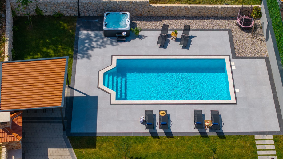 A private 8m x 4m  swimming pool
