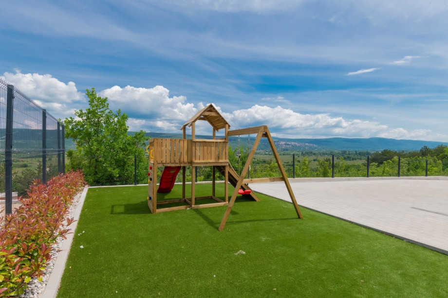 Younger guests have plenty of fun and entertainment on the artificial grass plot