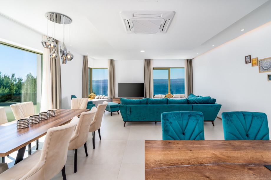 2nd floor level where you have a first living and dining area and offers a cozy living room with sofa