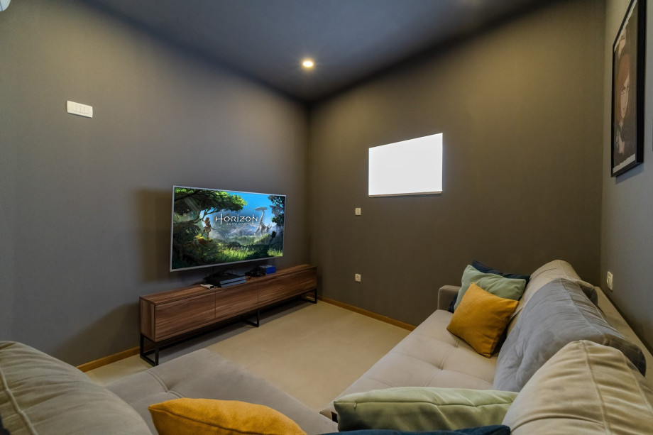 There is a Media Room with a PS4, flat-screen TV, A/C and a sofa that can be converted into a sofa bed