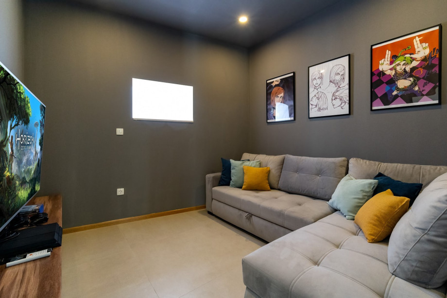 There is a Media Room with a PS4, flat-screen TV, A/C and a sofa that can be converted into a sofa bed