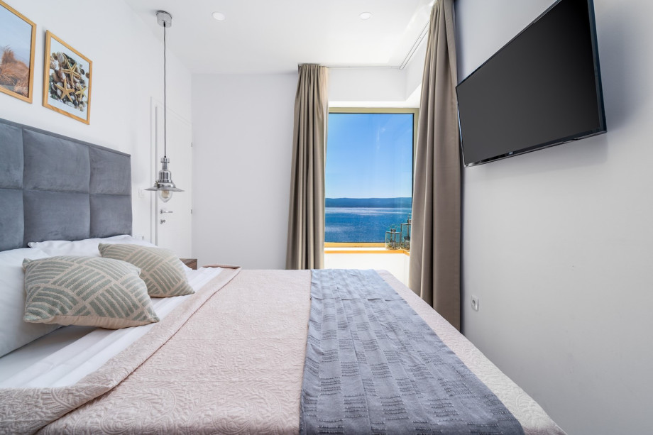 A Bedroom No 6 with double bed 160 x 200 cm, A/C, and sea views