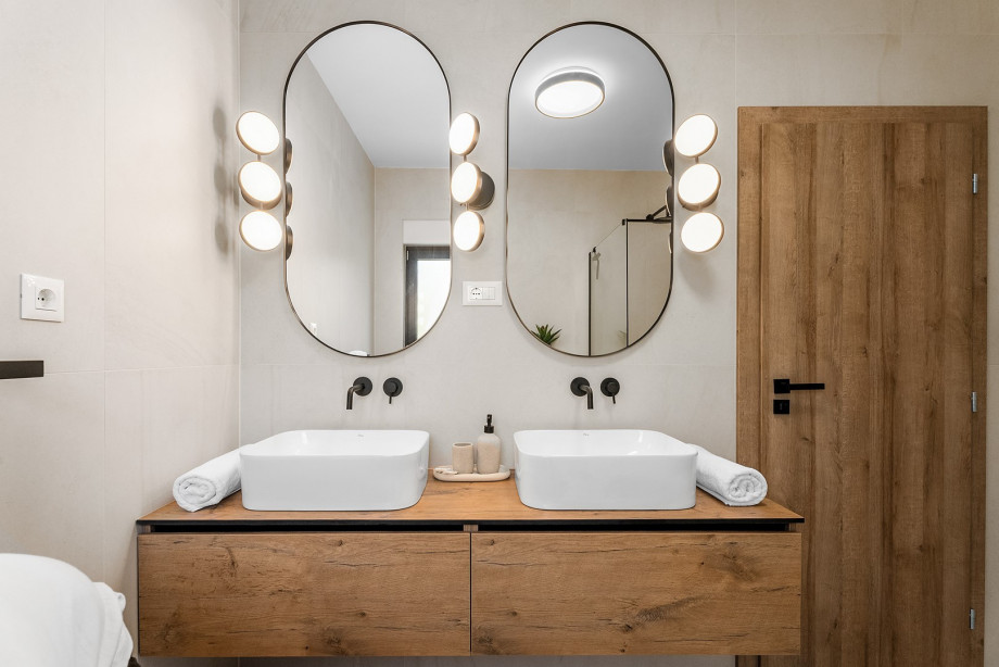 Family bathroom with shower and dual sinks