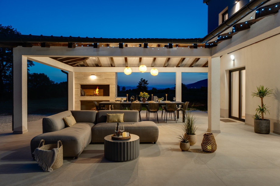 A covered outdoor dining space for up to 10 guests