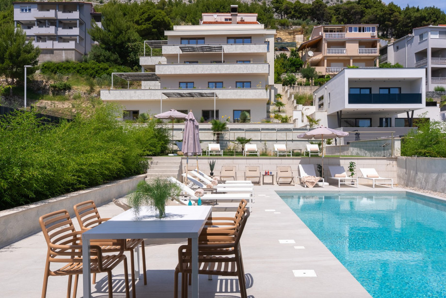 Holiday Resort Almissum, a stunning 11-bedroom luxury villa just 200 meters from the pristine sandy beach.