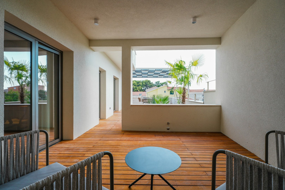 There is a terrace with outdoor furniture on the south (71sqm) and west (16sqm) overviewing the pool and the sea