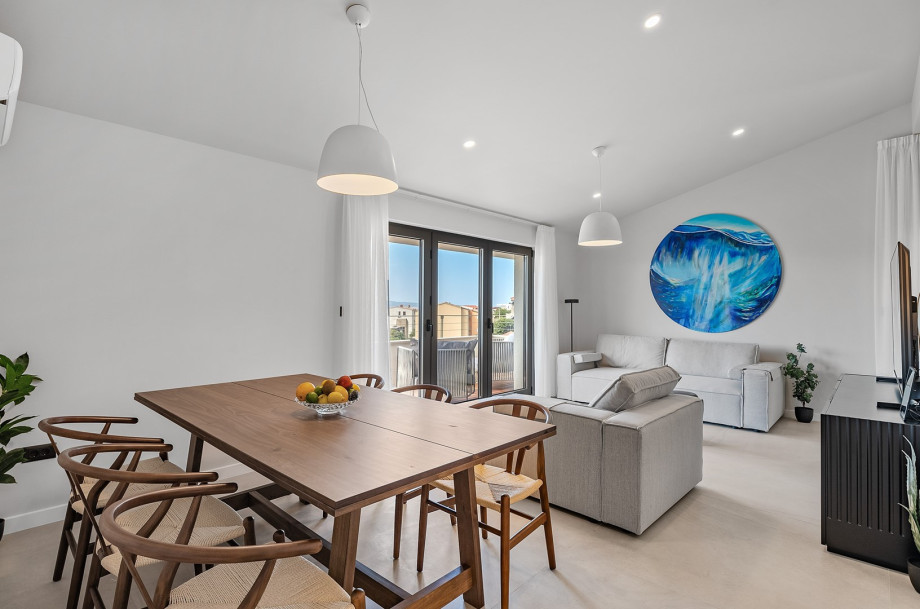 The third floor offers a living/dining area with a fully equipped kitchen (38sqm) and a terrace in front with sea views (19sqm)