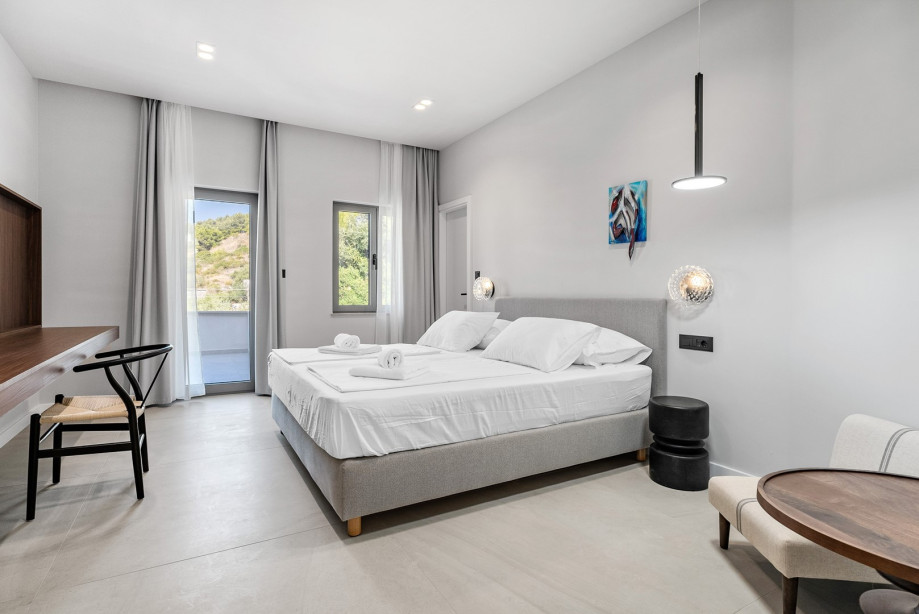 Bedroom NO9 (22sqm) with king-size bed and walk-in wardrobe, en-suite bathroom with a shower