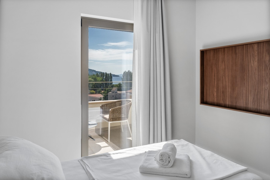 Bedroom NO11 with a direct approach to a spacious terrace (19sqm) with outdoor furniture