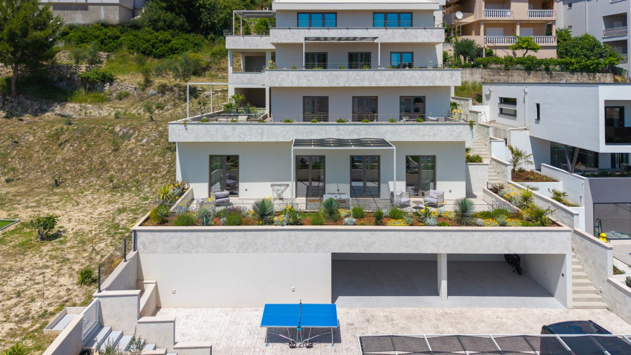 Holiday Resort Almissum, a stunning 11-bedroom luxury villa just 200 meters from the pristine sandy beach.