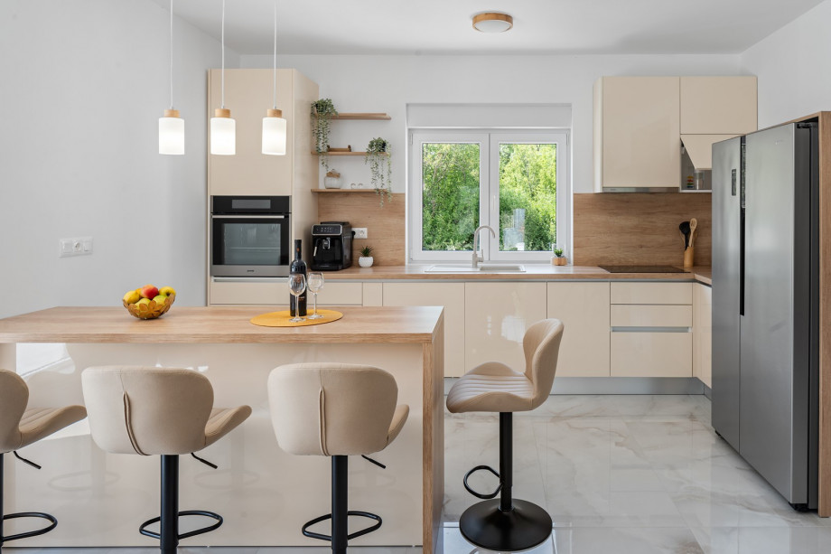 Modern appliances (espresso machine, microwave, dishwasher, toaster, kettle...), and everything you need for homemade meals