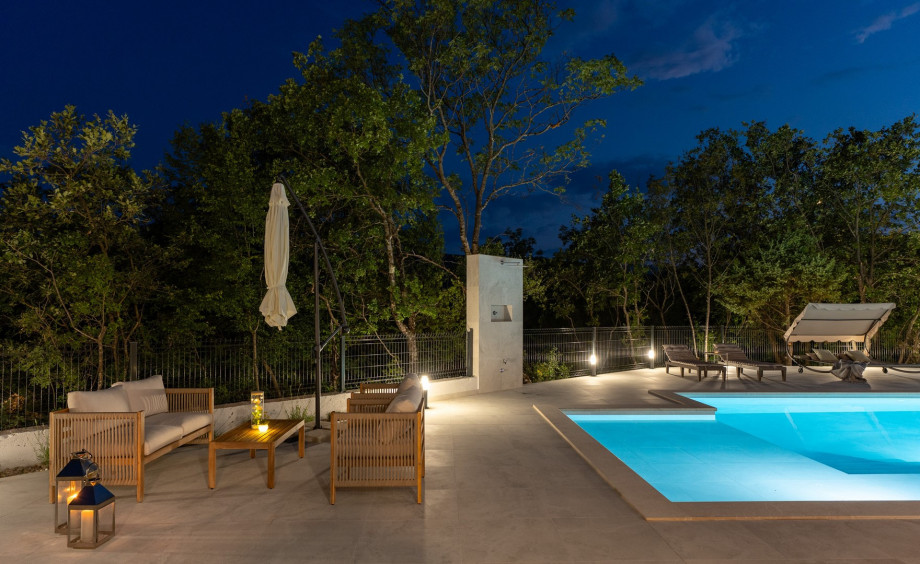 Outdoor dining area
Unwind on the outdoor seating area under the night sky, perfect for cozy evening moments.