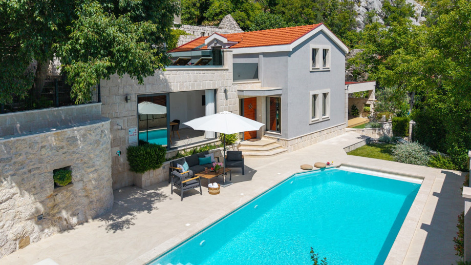 There are two covered parking places and the property is fenced