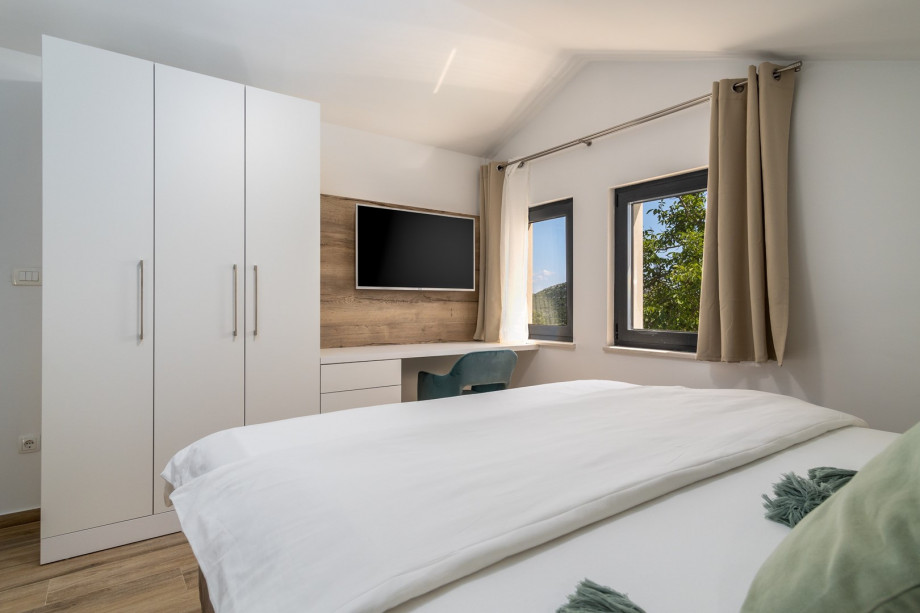 Bedroom No2 also offers a TV, and an A/C