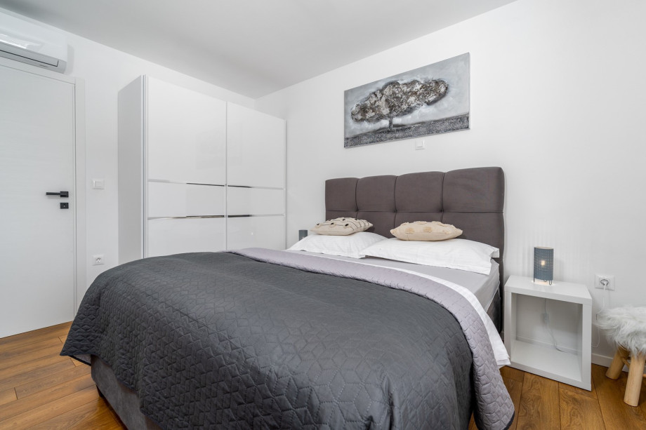 Bedroom No2 with double bed 160cm x 200cm, a TV, Air-condition and pool views