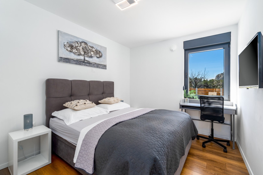 Bedroom No2 with double bed 160cm x 200cm, a TV, Air-condition and pool views