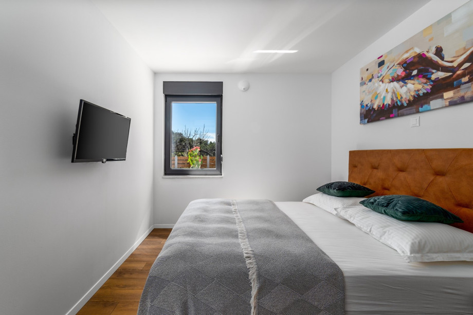 Bedroom No3 with double bed 160cm x 200cm, a TV, Air-condition and pool views