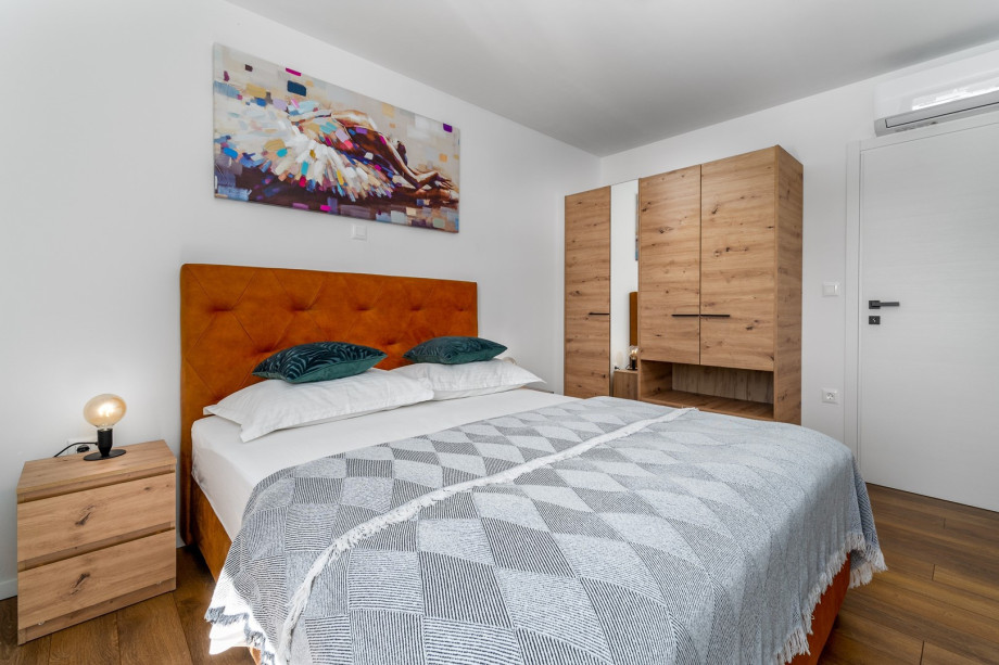Bedroom No3 with double bed 160cm x 200cm, a TV, Air-condition and pool views