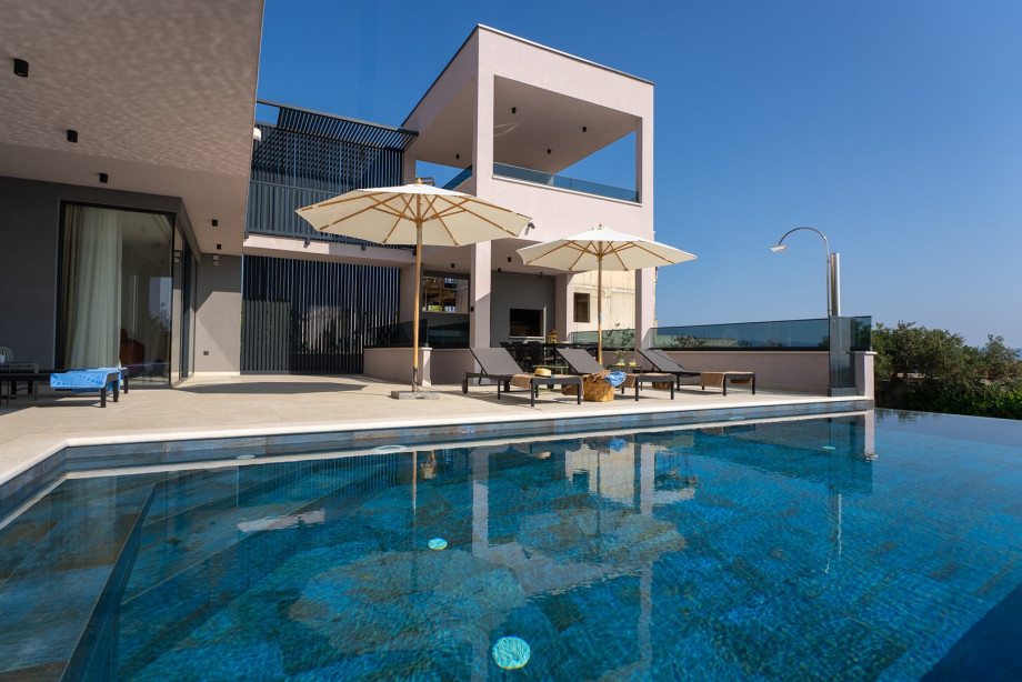 Outdoor Features: 8 sun loungers with umbrellas on a sea-facing sun deck