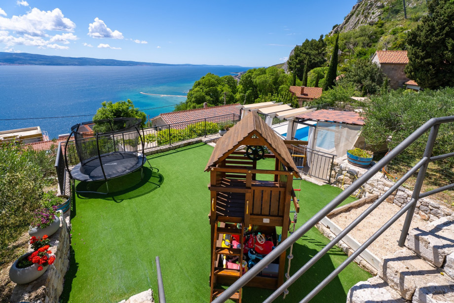 Well-located children playgound right next to the pool area, allowing parents to relax