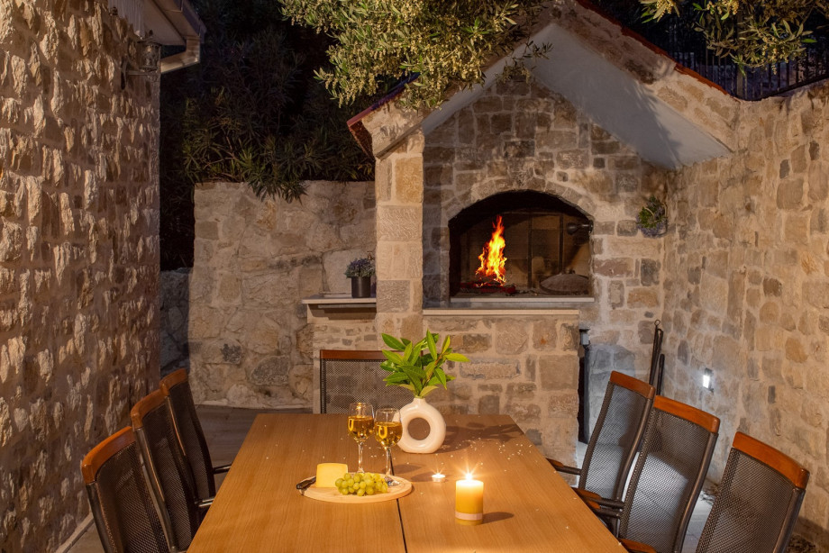 In front of the Villa is a BBQ grill with a dining table. Perfect for quiet evenings