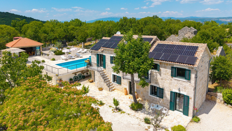 Surrounded by greenery offering absolute privacy.