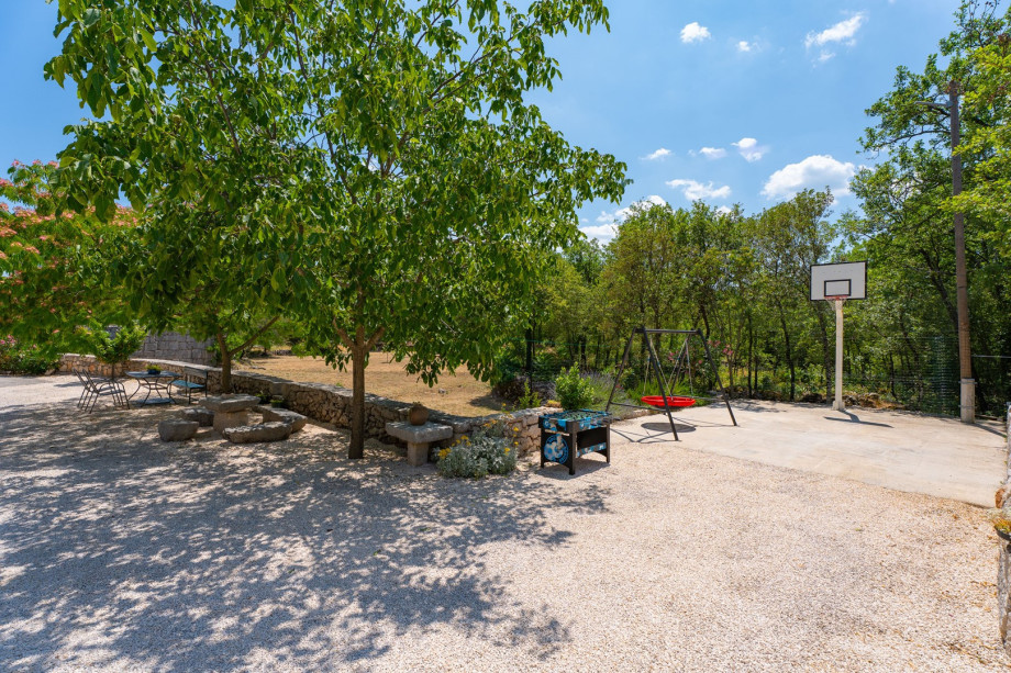 The outdoor area is very spacious and filled with many flower pots and lovely details that the owner carefully set around.