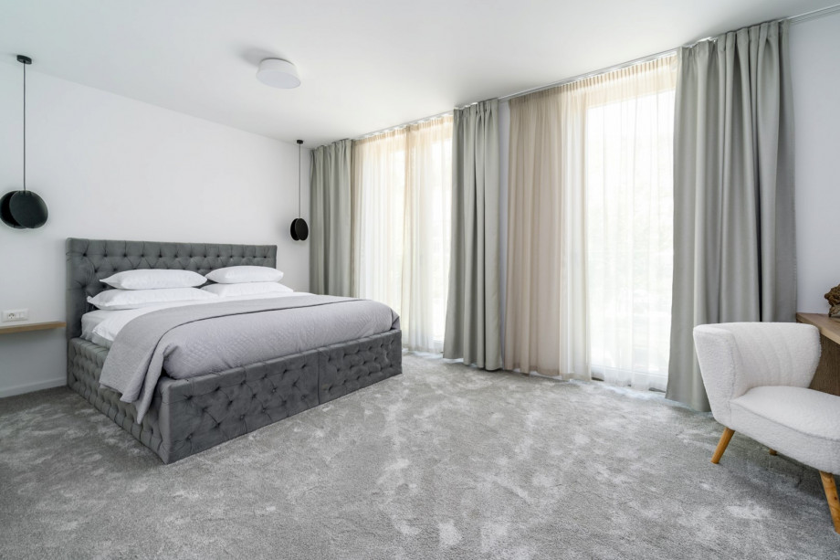 Bedroom No6 (North, 24sqm) offering mountain views, with a King size bed 200cm x 200cm, a TV