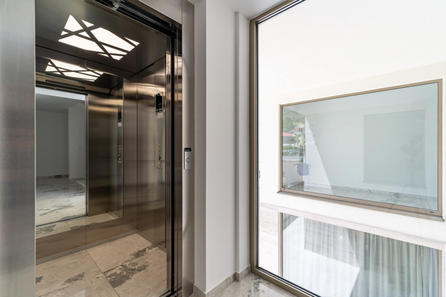 An elevator from the ground floor to the rooftop for easier indoor communication, besides the staircase