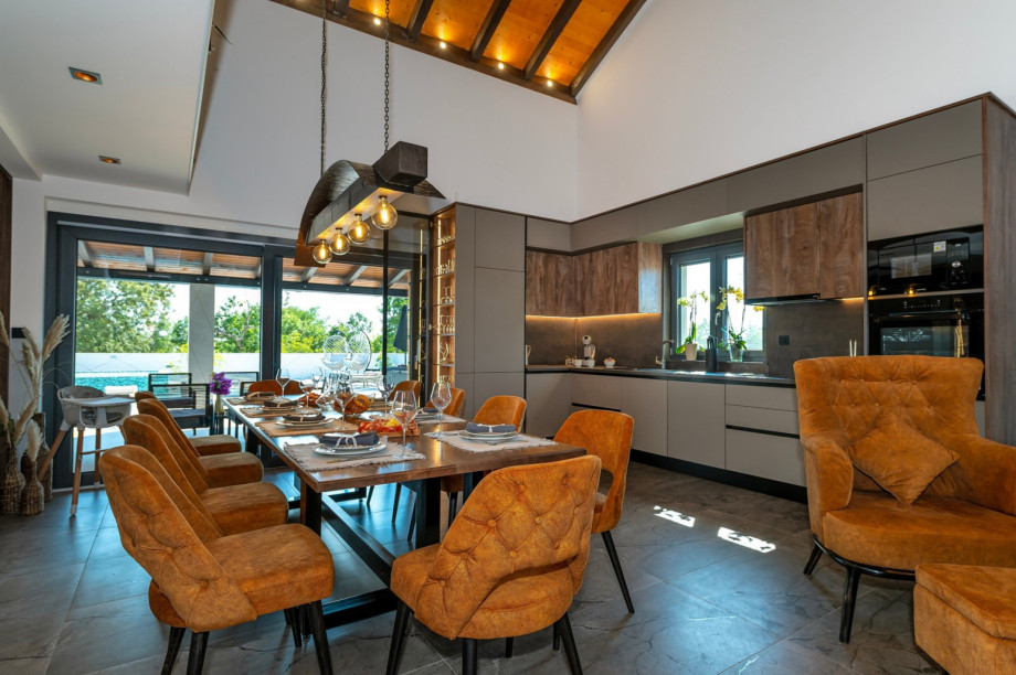 60 square meter open-plan living and dining area with a dining table for eight