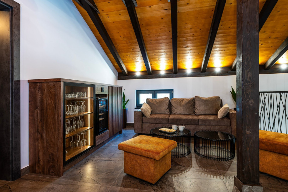 Gallery with a comfortable sofa that can convert into a sofa bed