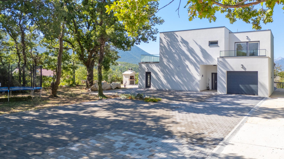 Five cars can be safely parked on a private plot , and having a car is advised. At the entrance is a video surveillance system