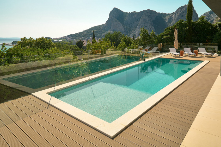 A private and heated swimming pool 8m x 3m with hydro massage and a 2m shallow part