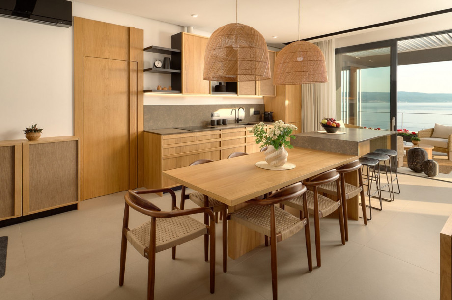 Adjacent is the fully equipped kitchen, complete with modern appliances