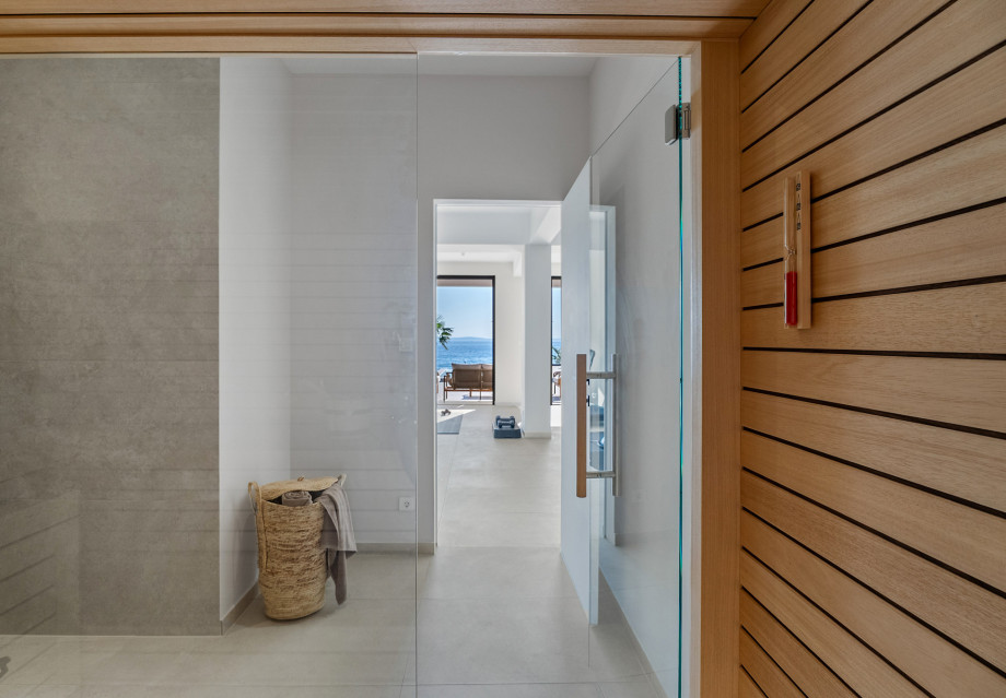 A luxurious Finnish sauna area 12sqm with a walk-in shower for ultimate relaxation