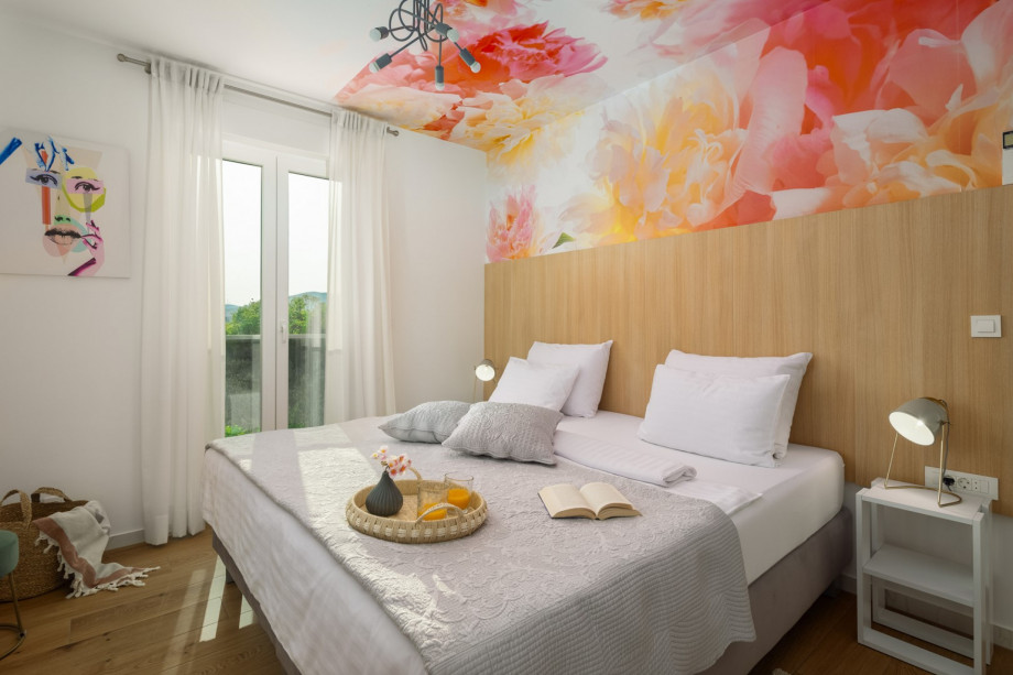 Bedroom No4 with a king-size bed (200x210 cm that can be separated for 2), a sofa bed (90x200)