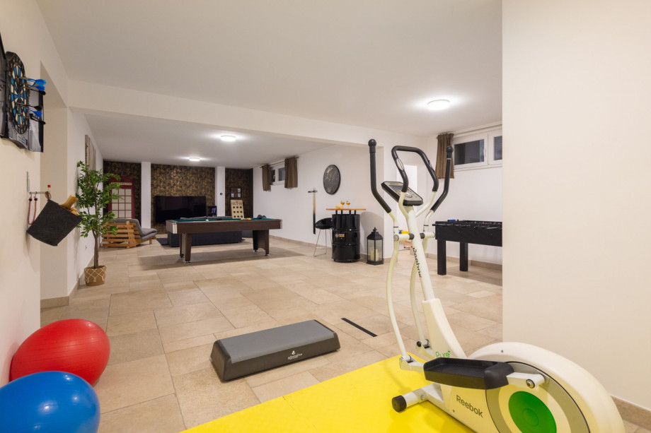 in case you want to work out, there are weights, pilates ball, and Orbitreck