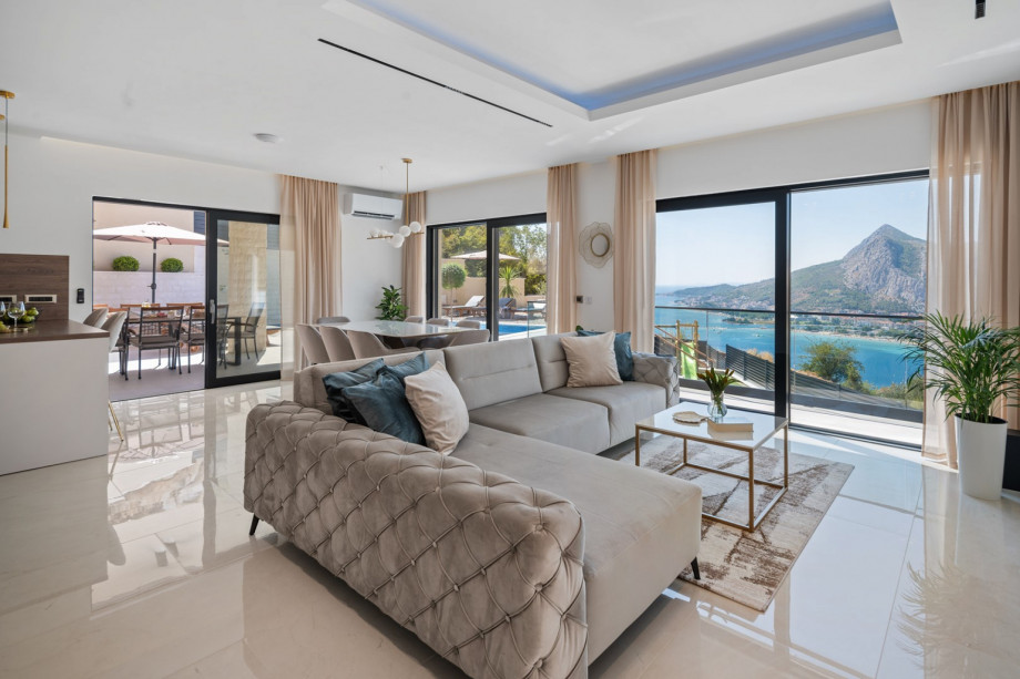 Fully air-conditioned living and dining area spanning 55 square meters