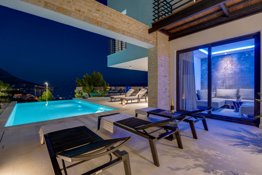 The sliding door takes you inside to the ground floor, to the Media room