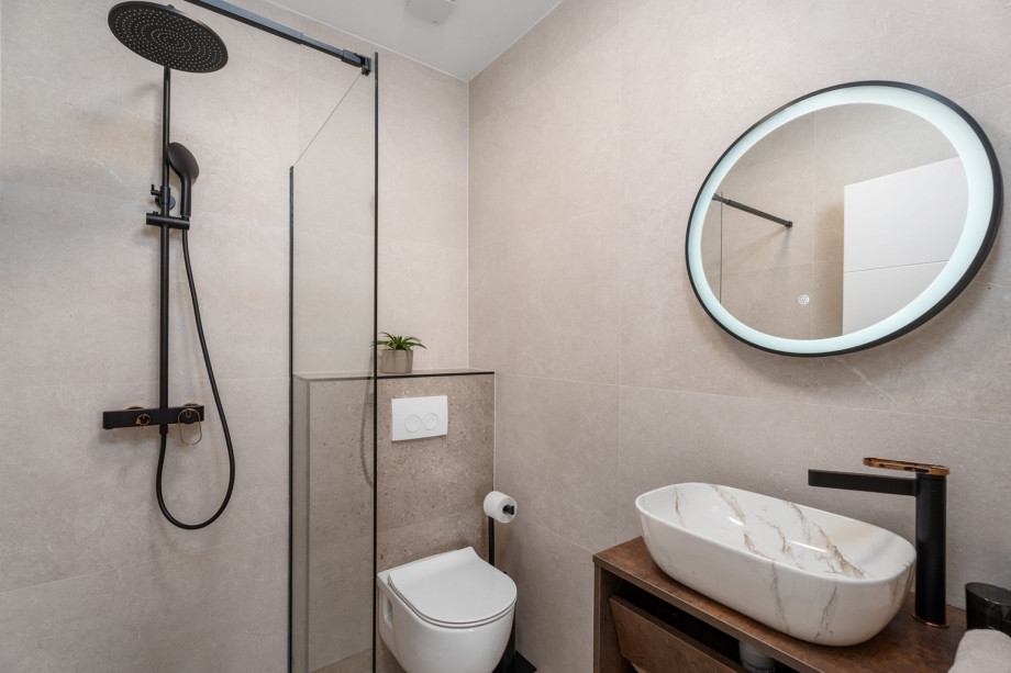 A Family bathroom No2 with a shower.